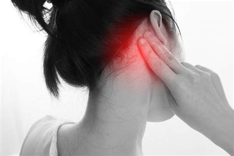 sharp pain in back of head on right side behind ear