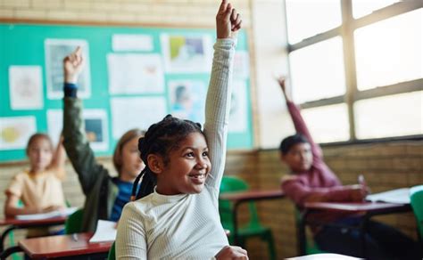 students asking questions in the classroom