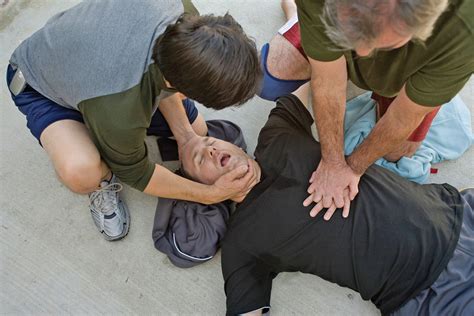 two people performing cpr