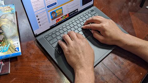 Hand typing on laptop with Office software on screen