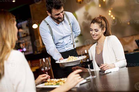 waiter serving food