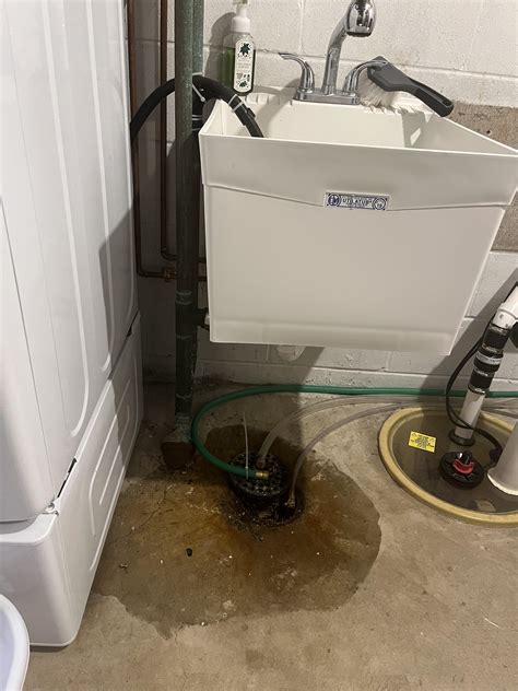 washing machine overflows when draining