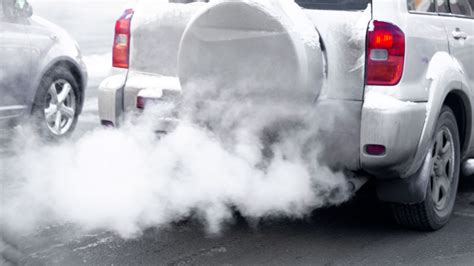what causes white smoke in a car in the morning