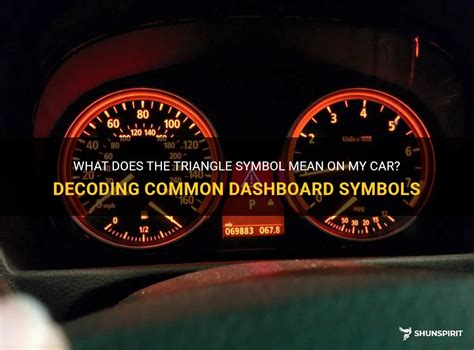what does a red triangle sign mean on dashboard