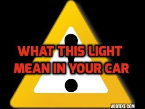 what does a yellow triangle mean in a car