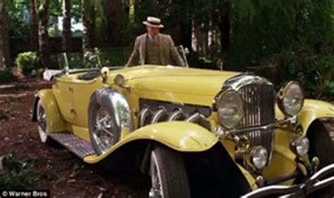 what does gatsby's car symbolize in chapter 4