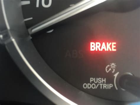 what does it mean when the brake light comes on the dashboard