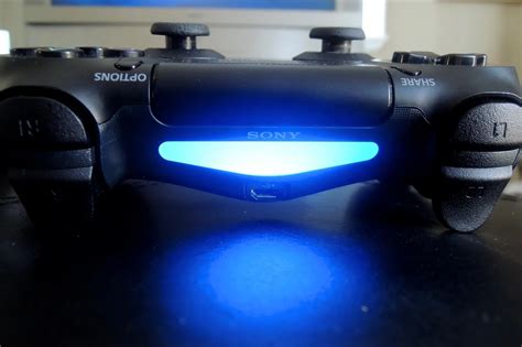 what does the light blue color mean on a ps4 controller