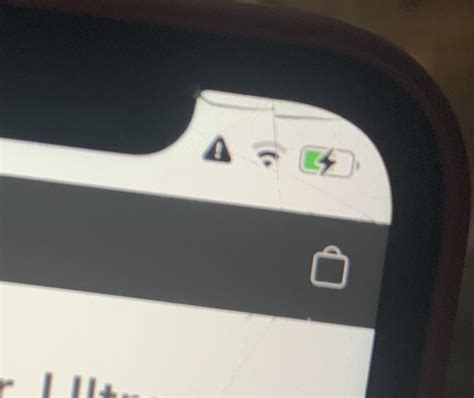 what does triangle with exclamation point mean on iphone