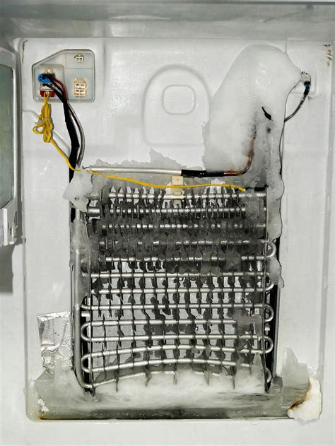 what is defrost system in refrigerator