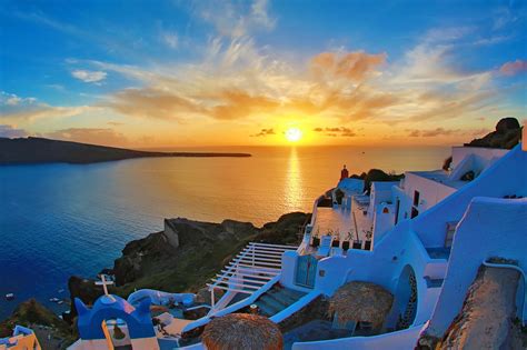 when does the sunset in santorini in july