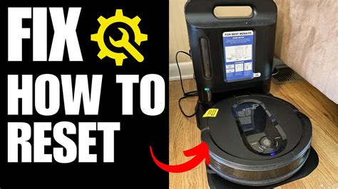 where is the reset button on a shark robot vacuum