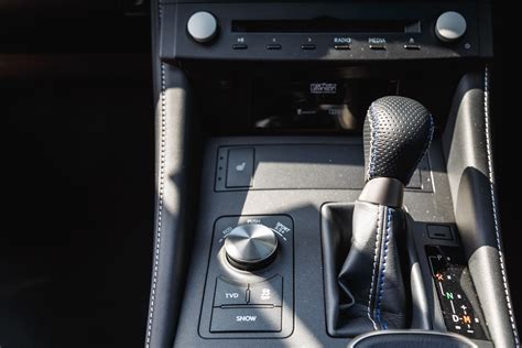 where is the trac button on lexus