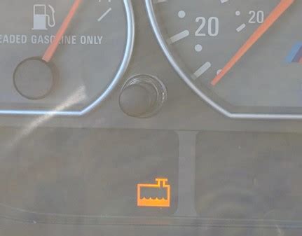 why does my low coolant light come on
