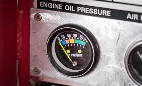 why does the oil pressure light come on and off