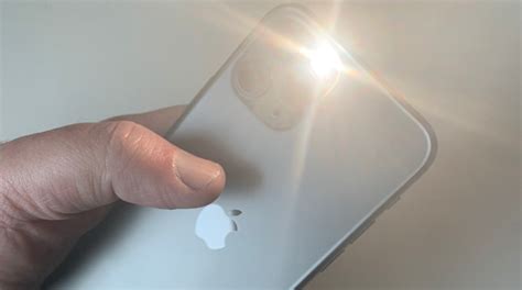 why is my flashlight not bright on my iphone 16