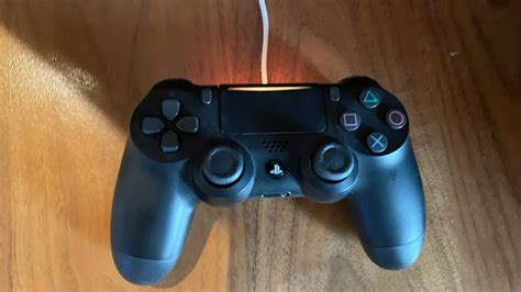 why is my ps4 controller flashing blue and not connecting after