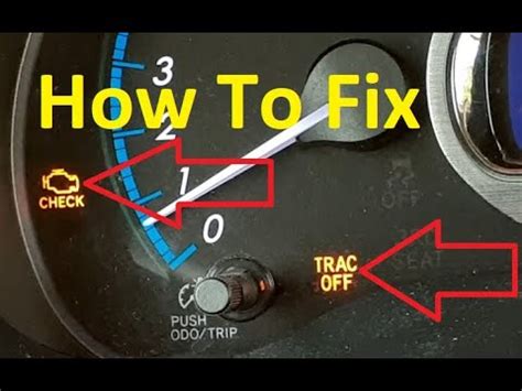 why is my trac off and check engine light on