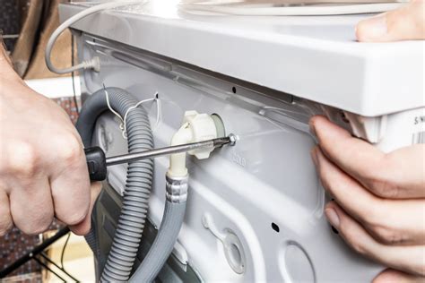 why is my washing machine leaking water from the top