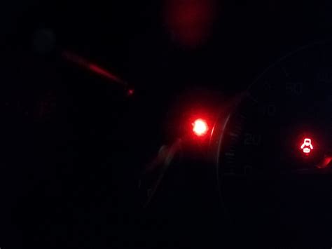 why is there a red light blinking in my car