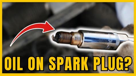 why would there be oil in my spark plug hole